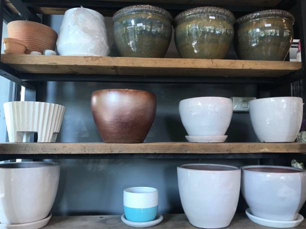 istock Flower vase on wooden shelf 1478706390