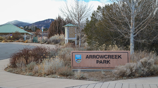 Reno, Nevada, United States – January 13, 2021: A sign stands at the entrance to Arrowcreek Park, a county municipal park in South Reno.