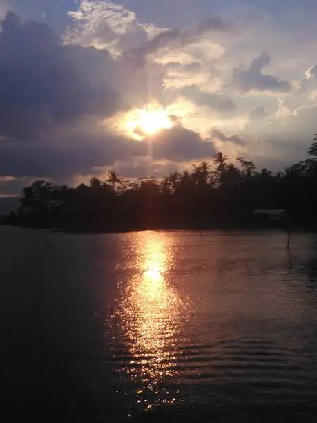 Portrait view beautiful sunset in Rawa Pening (Rawapening) lake in Semarang, Central Java, Indonesia