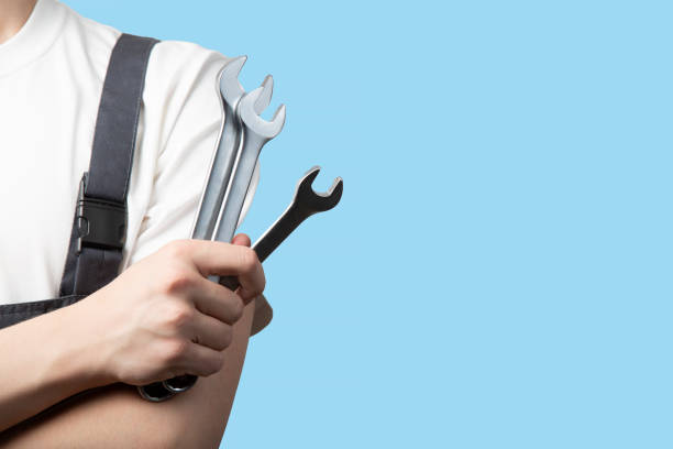 istock A young man in a car service worker's 1478712266
