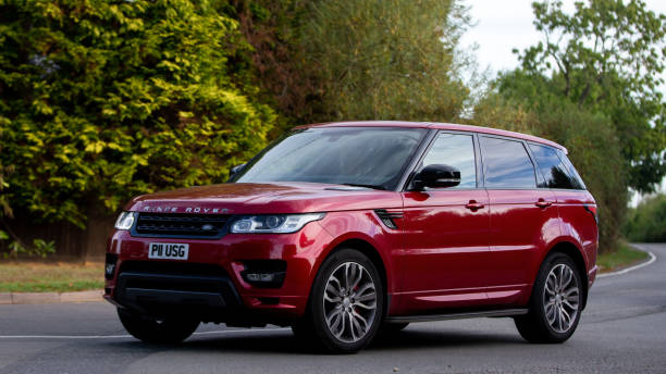 Range Rover Whittlebury,Northants,UK - August 28th 2022. 2016 red 4367cc Range Rover travelling on an English country road evoque stock pictures, royalty-free photos & images