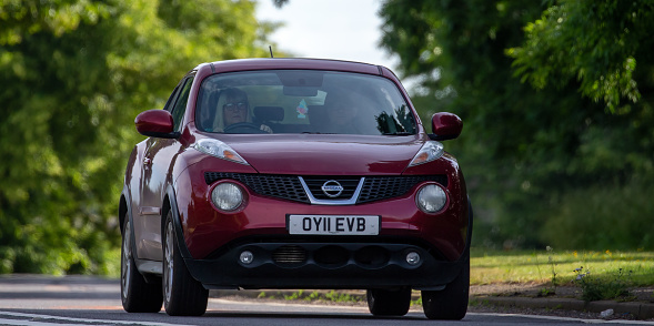 Bicester,Oxon,UK - June 19th 2022. 2011 NISSAN JUKE travelling on an English country road