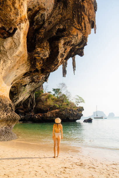 istock Cheerful woman on Railey beachin Krabi 1478714525