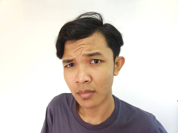 istock Asian man in seriously thinking, Asian man doubt 1478718161
