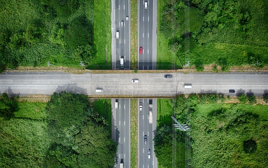 An aerial drone view of overpass bridge of ETON and South Luzon Expressway in Sta. Rosa, Laguna, Philippines.