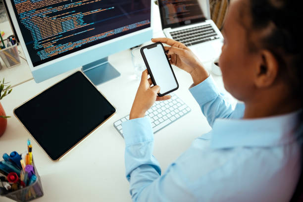 istock Young woman programming at her home office 1478725348