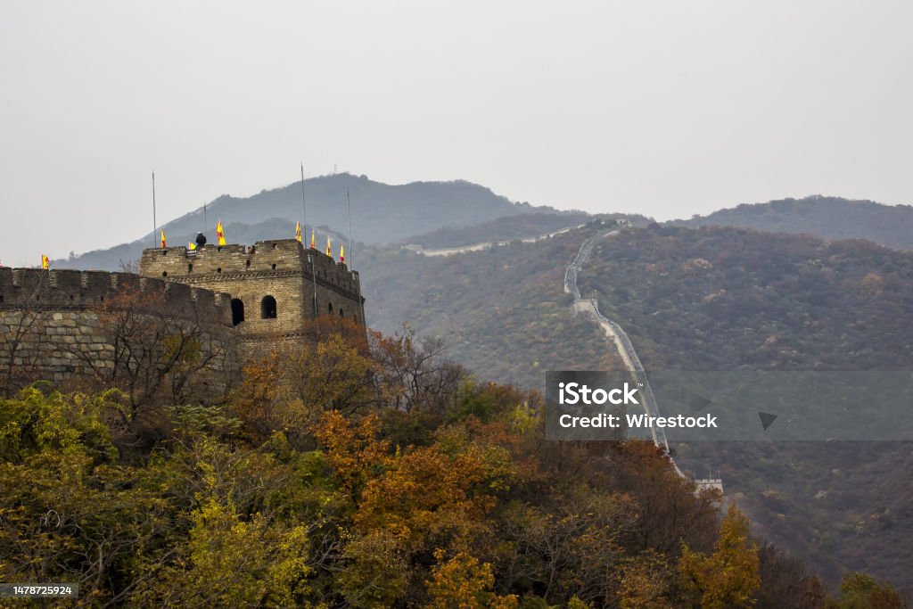Great Wall of China at Mutianyu section, Huairou District within the city limits of Beijing (China) Great Wall of China at Mutianyu section, located in Huairou District within the city limits of Beijing (China). Autumn/fall colors Ancient Stock Photo