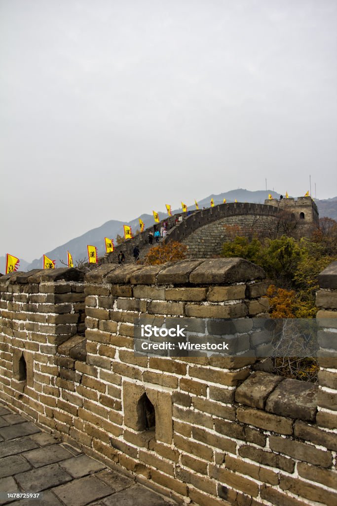 Great Wall of China at Mutianyu section, Huairou District within the city limits of Beijing (China) Great Wall of China at Mutianyu section, located in Huairou District within the city limits of Beijing (China). Autumn/fall colors Ancient Stock Photo