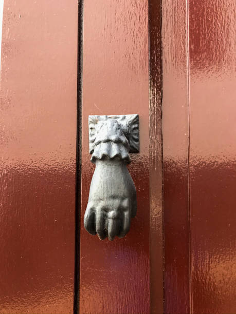 istock Door knocker in the form of a hand 1478728539