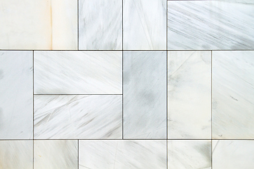 White polished marble tiled wall detail