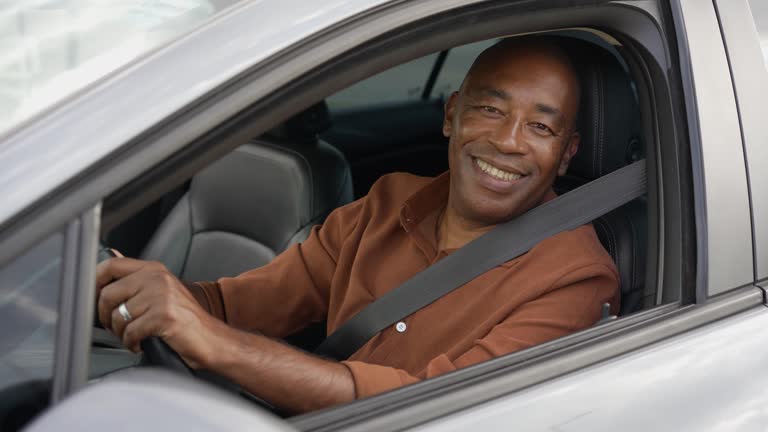 Portrait of a mature male driver in the car