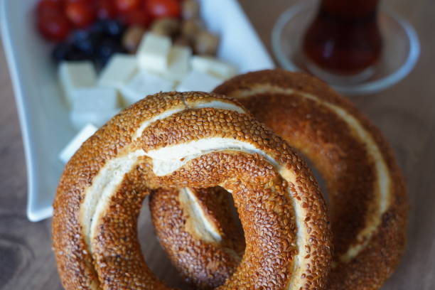 istock adana sesame bagel with tea and cheese on wooden table turkish simit 1478730763