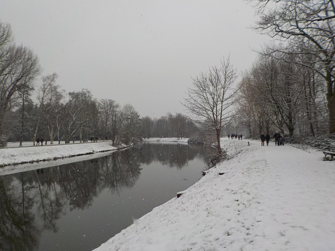 Nidda river is the second river next to the Main in Frankfurt. It is part of the green belt or green lung of the city. Snow is rare in these times.