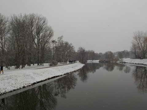 Nidda river is the second river next to the Main in Frankfurt. It is part of the green belt or green lung of the city. Snow is rare in these times.