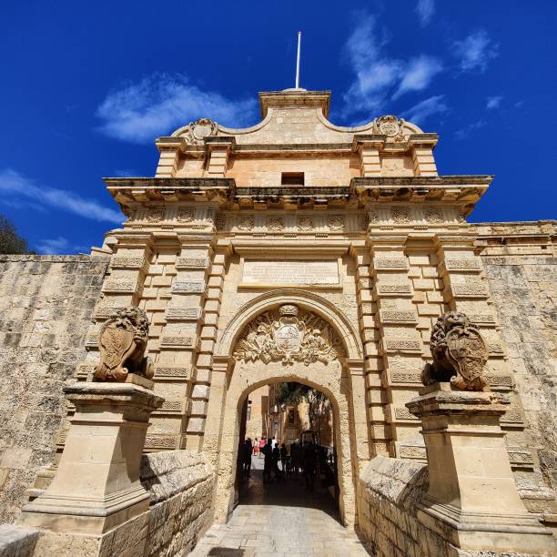 istock Mdina Gate with a cloudy blue sky in the background in Mdina, Malta 1478730932