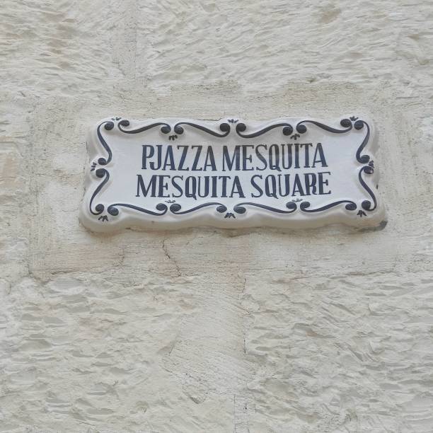 istock Sign on the white wall: Mesquita Square 1478730937