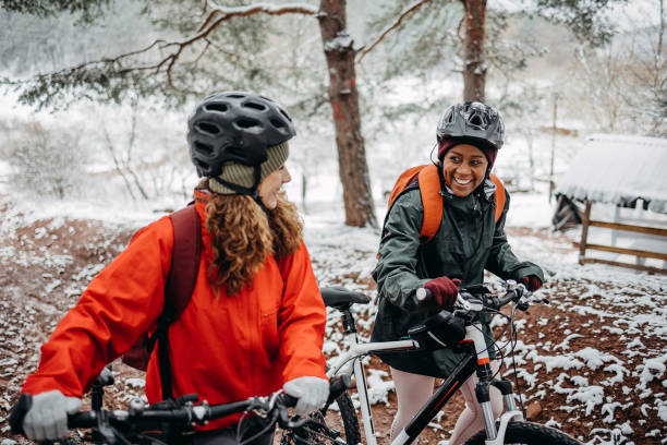 istock Two friends in the forest with bicycles 1478734954