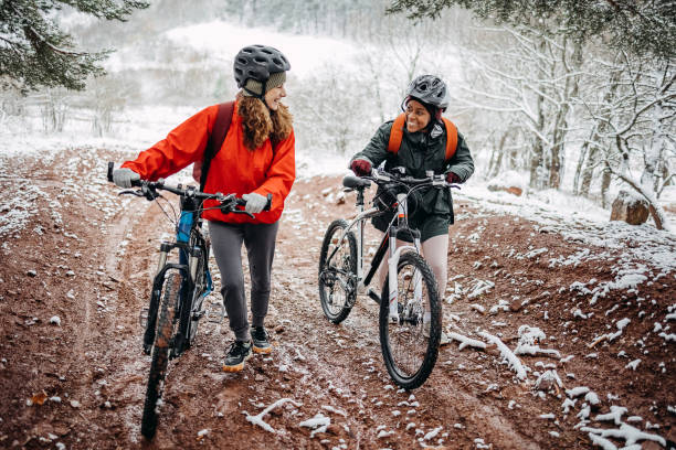 istock Two friends in the forest with bicycles 1478734955