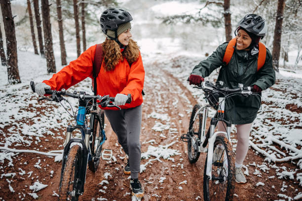 istock Two friends in the forest with bicycles 1478734979