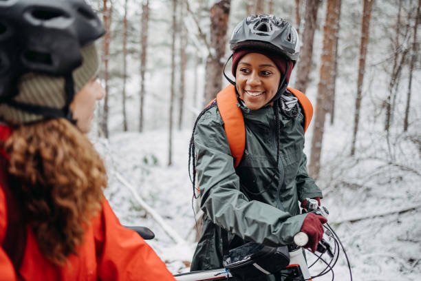 istock Two friends in the forest with bicycles 1478735390