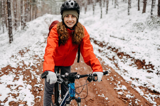 istock Woman rides a bicycle in the forest 1478736076