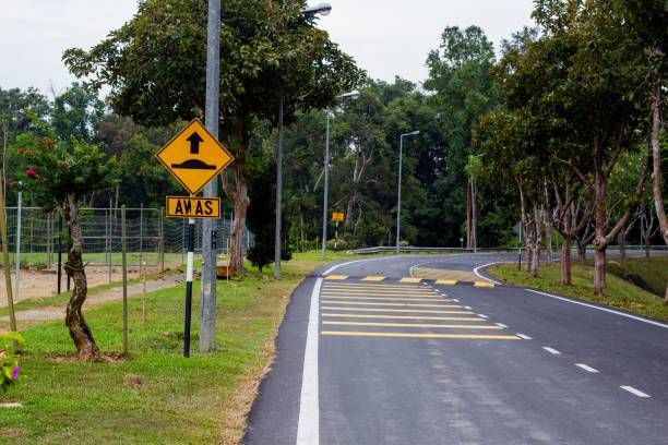 istock Road curve with street signs 