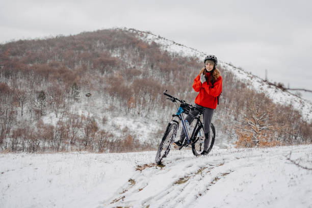 Biking in the snow is super fun on a fat bike. The tires are wide enough so that traction is great, and the tires do not sink into the packed snow of the cross country ski trail.