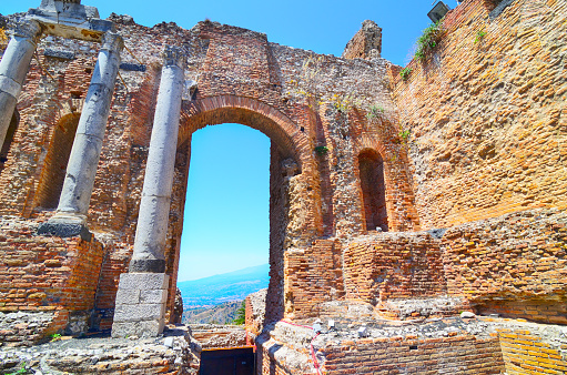 Ruins of the Greco-Roman amphitheatre at Taormina, Sicily, Italy