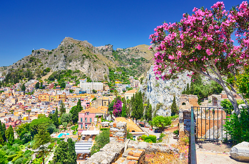 Taormina town with Mount Etna on background