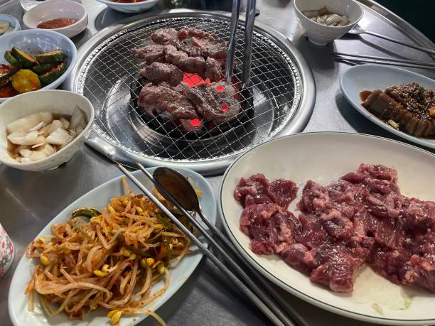 istock Table setting at a local barbecue restaurant in Korea 1478742811