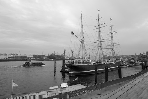 Hamburg, Germany - 03 30,2023: the old port of Hamburg under cloudy sky