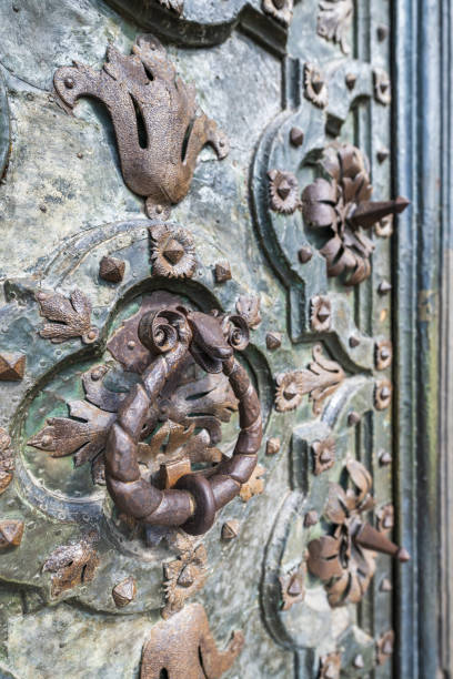 istock Vertical closeup of a baeutiful ornament on a wall 1478744459
