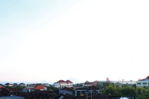 View of a city with clear blue sky and white clouds