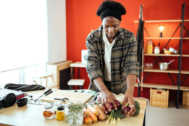 istock Woman prepares vegetables for lunch 1478746700