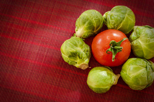 Fresh Vegetables on the Table in the Kitchen, Highlighting the Concept of Home-Grown Produce. The Scene Showcases a Variety of Vegetables Harvested from a Home Garden, Emphasizing the Natural and Healthy Qualities of Home-Grown Food. The Bright and Inviting Kitchen Setting Enhances the Focus on Nutritious, Locally-Sourced Ingredients.