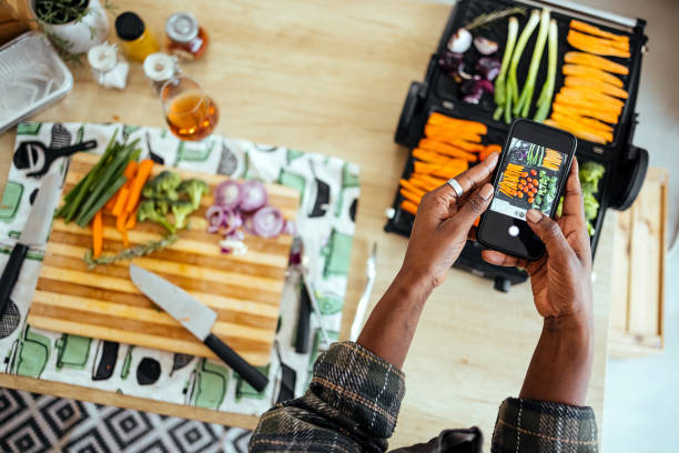 istock Woman photographs vegetables 1478748953