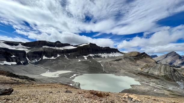 istock Small lake surrounded by rocky hills in the Great Divide Trail, Canada 1478751424