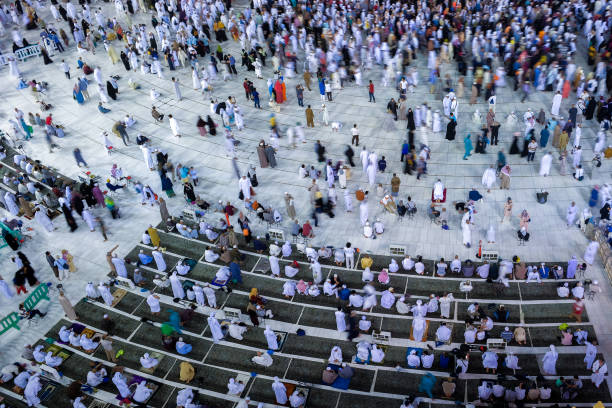 istock passing people in the courtyard of the Kaaba 1478753870