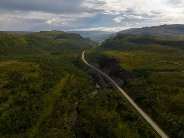 istock Natural landscape of a road under a cloudy sky 1478754305