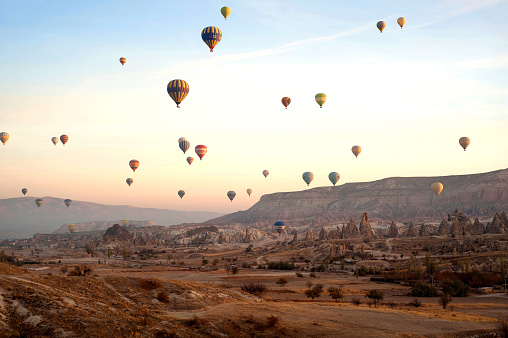 Cappadocia, Turkey – November 10, 2017: Goreme, Cappadocia,Turkey. November 10th 2017
Hot air balloons over the landscape of Cappadocia, near the village of Goreme, Turkey.