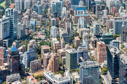 Experience the stunning skyline and cityscape of Santiago, Chile, captured in this panoramic photo. The vibrant capital city is nestled in the foothills of the Andes, offering a unique blend of urban and natural beauty. From the iconic skyscrapers and historic landmarks to the lush green spaces and bustling streets, Santiago is a feast for the senses. This image is the perfect addition to any travel or tourism campaign, showcasing the stunning beauty and unique character of this vibrant city.