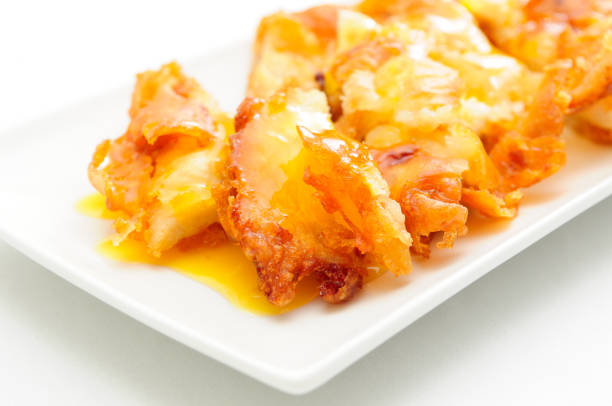 istock lemon chicken battered and deep fried and lemon sauce 1478756776