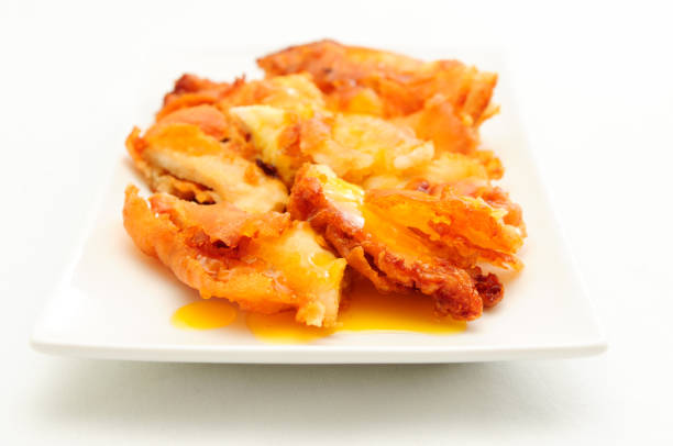 istock lemon chicken battered and deep fried and lemon sauce 1478756793
