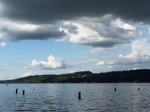 Dark clouds above a small beach by Lake Washington in northern Seattle