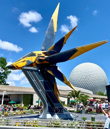 Orlando, United States – June 08, 2022: Outside the Gardens of the Galaxy roller coaster, Cosmic Rewind. Star Blaster ship model.