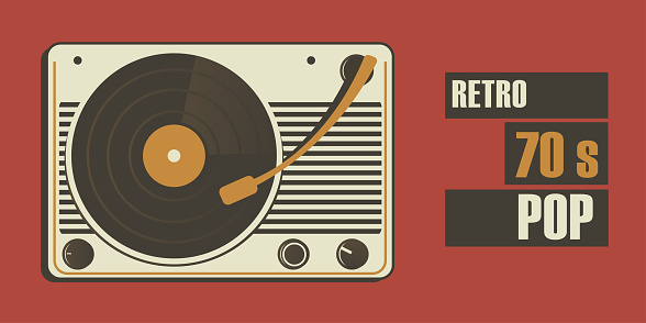 Tape recorder for playing vinyl records retro background. 70s concept.