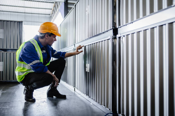 istock Warehouse staff worker reading cargo box label. People working for inventory goods cargo shipping management team. 1478772044