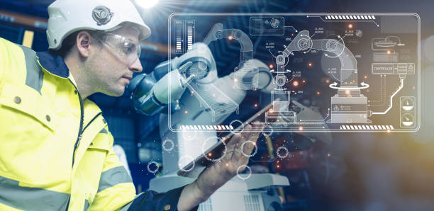 istock Smart Engineer advance industry robot arm in modern automation factory production technology Industry 4.0 manufacturing industrial revolution using robotic software control operation. 1478772134