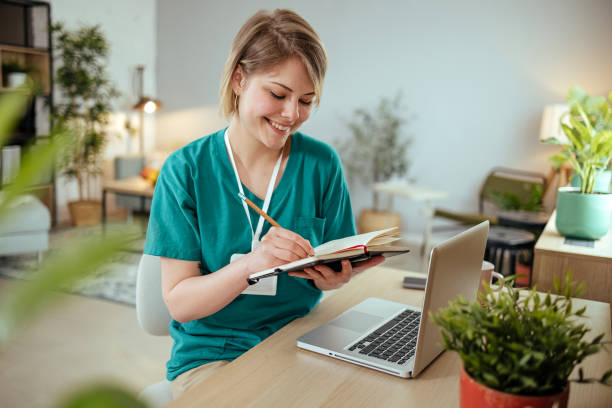 Nurse work from home stock photo