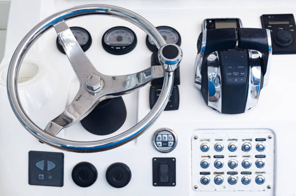 istock Luxury yacht control panel with steering wheel, gear levers, navigation devices and control buttons. 1478781899